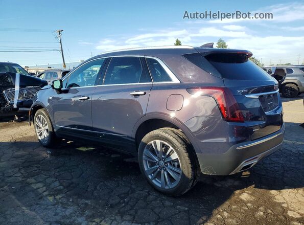1GYKNDR40RZ759080 2024 CADILLAC XT5 Purple Rear left