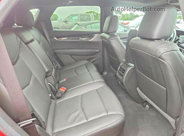 1GYKNDR46PZ113359 2023 CADILLAC XT5 Red Սալոնի հետևի տեսք