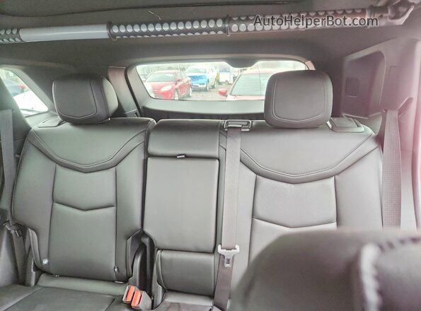 1GYKNDR46PZ113359 2023 CADILLAC XT5 Red Հետևի նստատեղերի տեսք