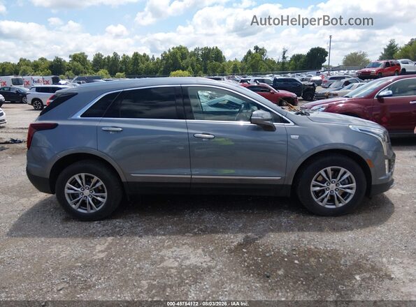 1GYKNDRS9MZ213532 2021 CADILLAC XT5 Gray Rear interior view