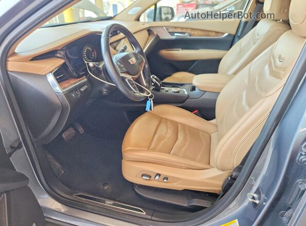 1GYKNFRS1MZ219921 2021 CADILLAC XT5 Gray Vista interior delantera
