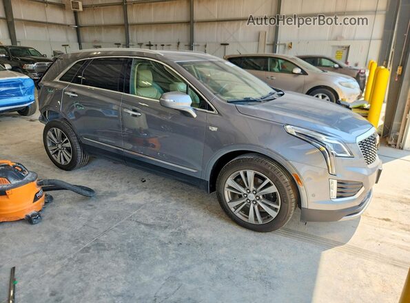 1GYKNFRS1MZ219921 2021 CADILLAC XT5 Gray Delantero derecho