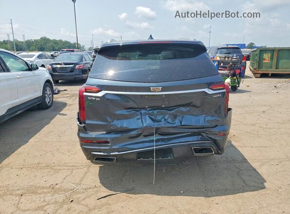 1GYKPCRS2LZ144699 2020 CADILLAC XT6 Blue Հետևի տեսք