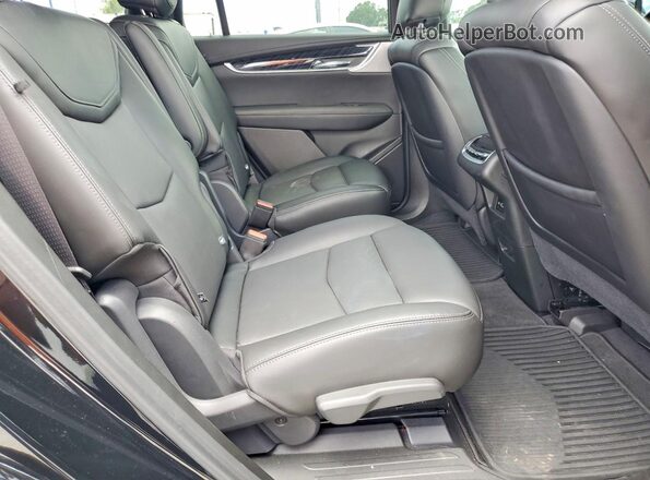 1GYKPCRS7RZ743977 2024 CADILLAC XT6 Black Vista interior trasera