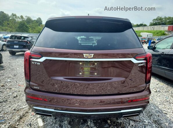 1GYKPDRS3PZ181823 2023 CADILLAC XT6 Maroon Հետևի տեսք