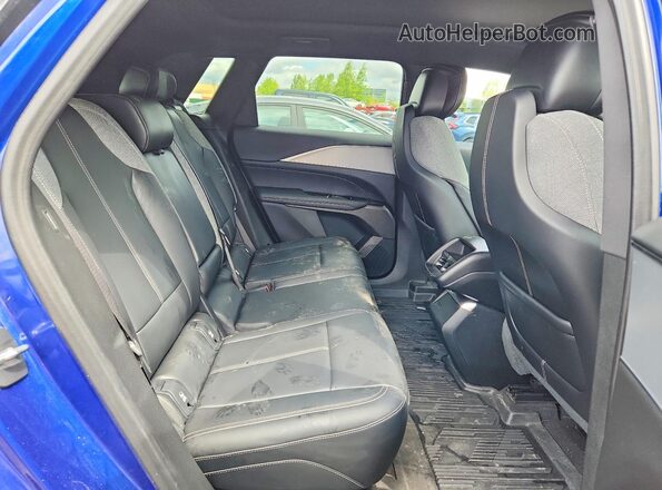 1GYKPMRK7RZ107744 2024 CADILLAC OTHER Синий Вид задней части салона