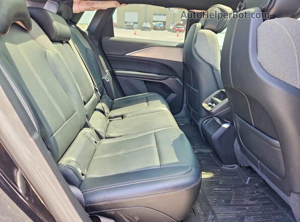 1GYKPMRK7RZ108702 2024 CADILLAC OTHER Black უკანა სალონის ხედი