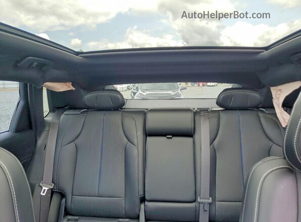 1GYKPPRL1PZ003192 2023 CADILLAC OTHER Silver Vista de los asientos traseros