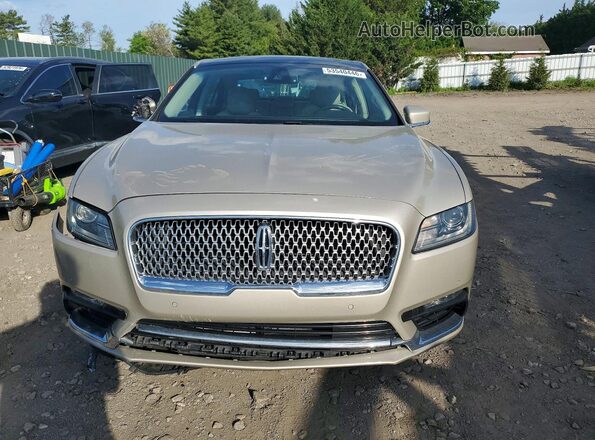 1LN6L9NPXH5628945 2017 LINCOLN CONTINENTA Gold Widok z przodu