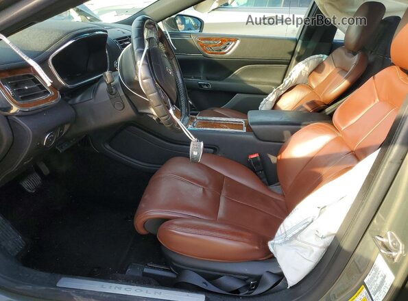 1LN6L9RP1H5607413 2017 LINCOLN CONTINENTA Green Widok wnętrza z przodu