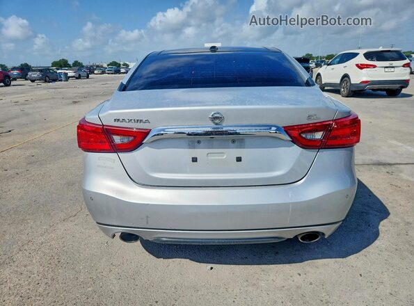 1N4AA6AP1GC904065 2016 NISSAN MAXIMA Серебряный Вид сзади