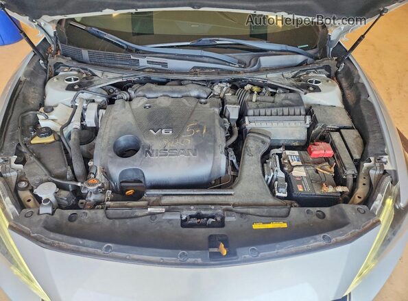 1N4AA6AP2JC388550 2018 NISSAN MAXIMA Серебряный Вид задней части салона