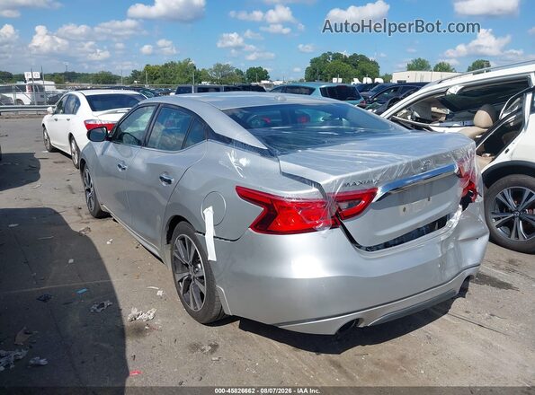 1N4AA6AP4JC387738 2018 NISSAN MAXIMA Серебряный Задняя левая четверть