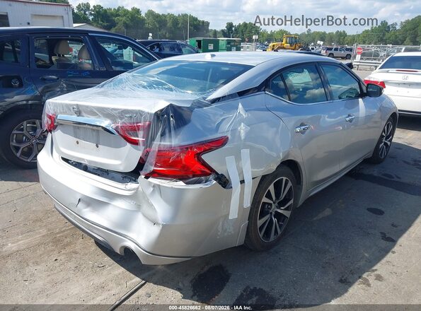 1N4AA6AP4JC387738 2018 NISSAN MAXIMA Серебряный Задняя правая четверть