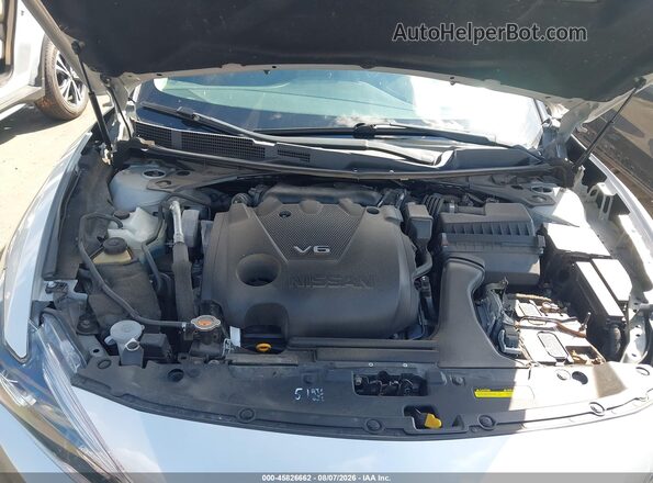 1N4AA6AP4JC387738 2018 NISSAN MAXIMA Серебряный Вид сзади