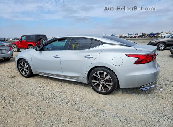 1N4AA6AP5JC367319 2018 NISSAN MAXIMA Silver Trasero izquierdo