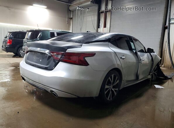 1N4AA6AP5JC385240 2018 NISSAN MAXIMA Серебряный Задняя правая четверть
