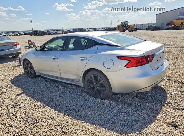 1N4AA6AP6JC400277 2018 NISSAN MAXIMA Silver Trasero izquierdo