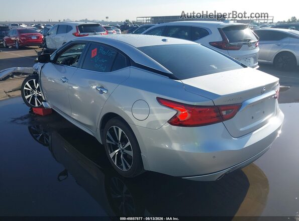 1N4AA6AP9JC403836 2018 NISSAN MAXIMA Серебряный Задняя левая четверть