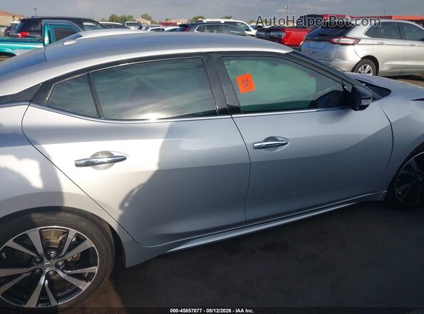 1N4AA6AP9JC403836 2018 NISSAN MAXIMA Серебряный Вид задней части салона