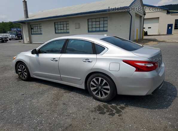 1N4AL3AP2GC156905 2016 NISSAN ALTIMA Silver Trasero izquierdo