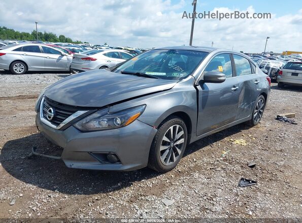 1N4AL3AP2GC196871 2016 NISSAN ALTIMA Gray Vista tres cuartos delantera izquierda