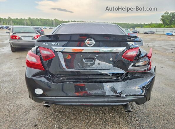 1N4AL3AP2JC221288 2018 NISSAN ALTIMA Black Rear view