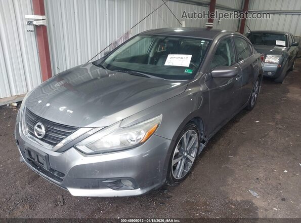 1N4AL3AP3GC194790 2016 NISSAN ALTIMA Gray Vista tres cuartos delantera izquierda