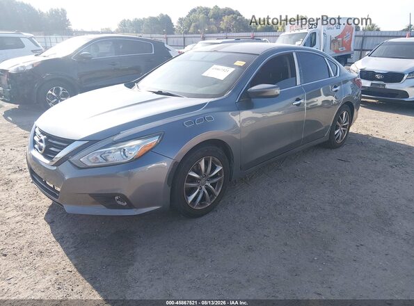 1N4AL3AP3JC118445 2018 NISSAN ALTIMA Gray Vista tres cuartos delantera izquierda