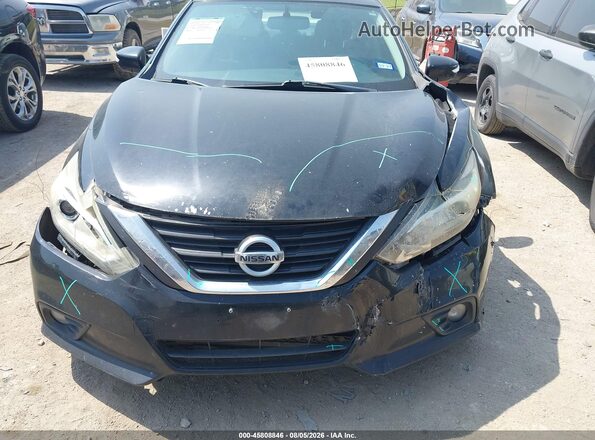 1N4AL3AP7GC158634 2016 NISSAN ALTIMA Black Front view