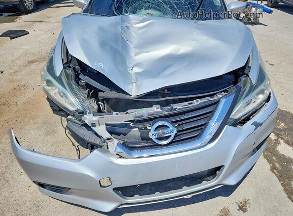 1N4AL3AP7JC105021 2018 NISSAN ALTIMA Silver Vista interior trasera