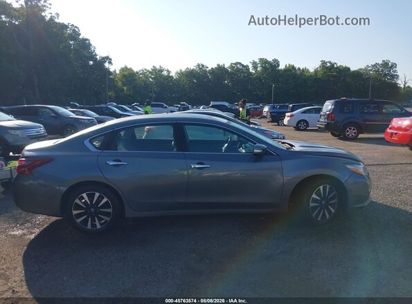 1N4AL3AP7JC130906 2018 NISSAN ALTIMA Серый Вид задней части салона