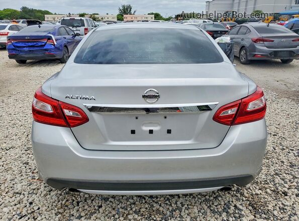 1N4AL3AP8GC140837 2016 NISSAN ALTIMA Silver Rear view