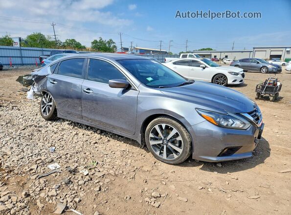 1N4AL3AP8JC117484 2018 NISSAN ALTIMA Gray Delantero derecho