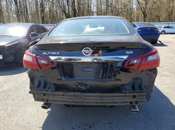 1N4AL3AP8JC135631 2018 NISSAN ALTIMA Black Rear view