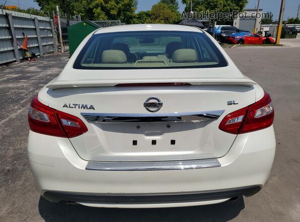 1N4AL3AP9GC161163 2016 NISSAN ALTIMA White Rear view
