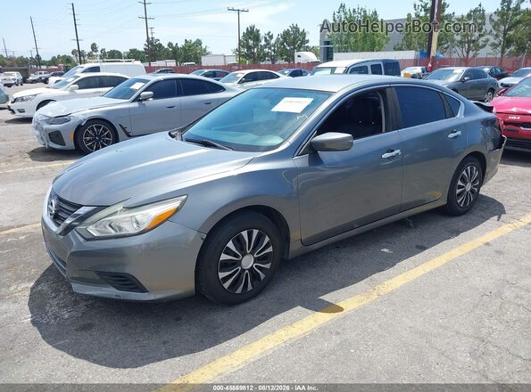 1N4AL3AP9GN373260 2016 NISSAN ALTIMA Gray Vista tres cuartos delantera izquierda