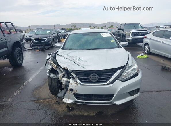 1N4AL3AP9GN379396 2016 NISSAN ALTIMA Серебряный Вид щитка приборов