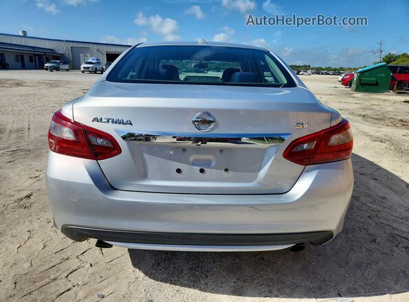 1N4AL3AP9JC156102 2018 NISSAN ALTIMA Серебряный Вид сзади