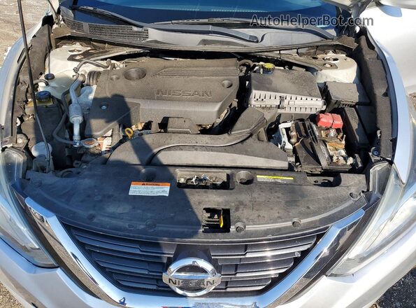 1N4AL3AP9JC281584 2018 NISSAN ALTIMA Silver Vista de la etiqueta del VIN