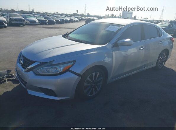 1N4AL3APXHC185585 2017 NISSAN ALTIMA Silver Vista tres cuartos delantera izquierda