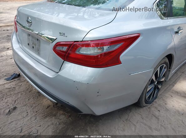 1N4AL3APXJC117034 2018 NISSAN ALTIMA Silver Widok z przodu