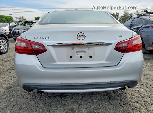 1N4AL3APXJC175483 2018 NISSAN ALTIMA Silver Widok z tyłu