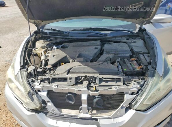 1N4AL3APXJC180988 2018 NISSAN ALTIMA Серебряный Вид задней части салона
