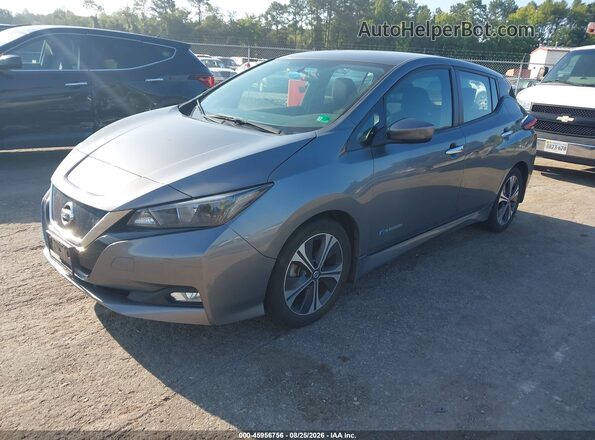 1N4AZ1CP0JC306565 2018 NISSAN LEAF Gray Vista tres cuartos delantera izquierda
