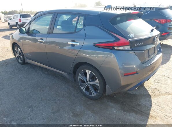 1N4AZ1CP0JC306565 2018 NISSAN LEAF Gray Trasero izquierdo