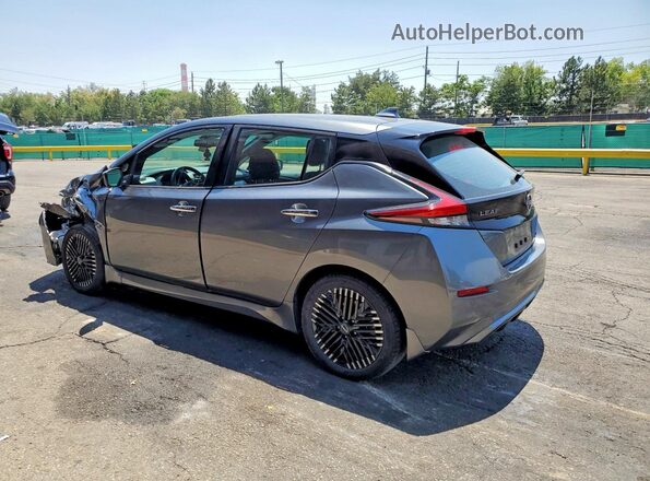 1N4CZ1CV4SC560045 2025 NISSAN LEAF Gray Trasero izquierdo