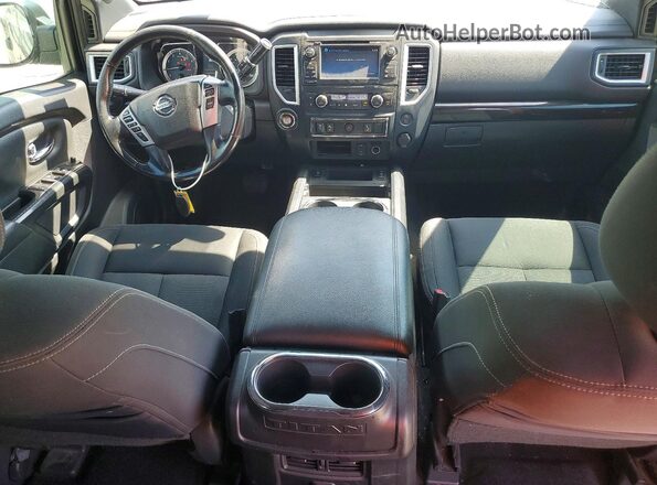 1N6AA1E65JN542491 2018 NISSAN TITAN Black Dashboard view