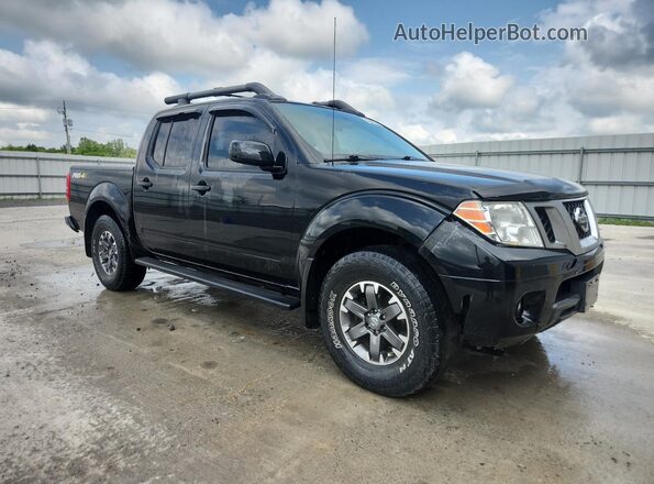 1N6AD0EV8JN744010 2018 NISSAN FRONTIER Black VIN კოდის სტიკერის ხედი