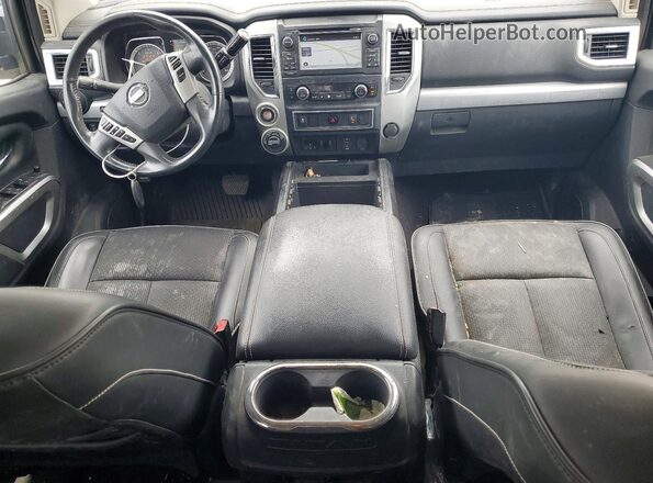 1N6BA1F45GN506732 2016 NISSAN TITAN Черный Вид панели приборов